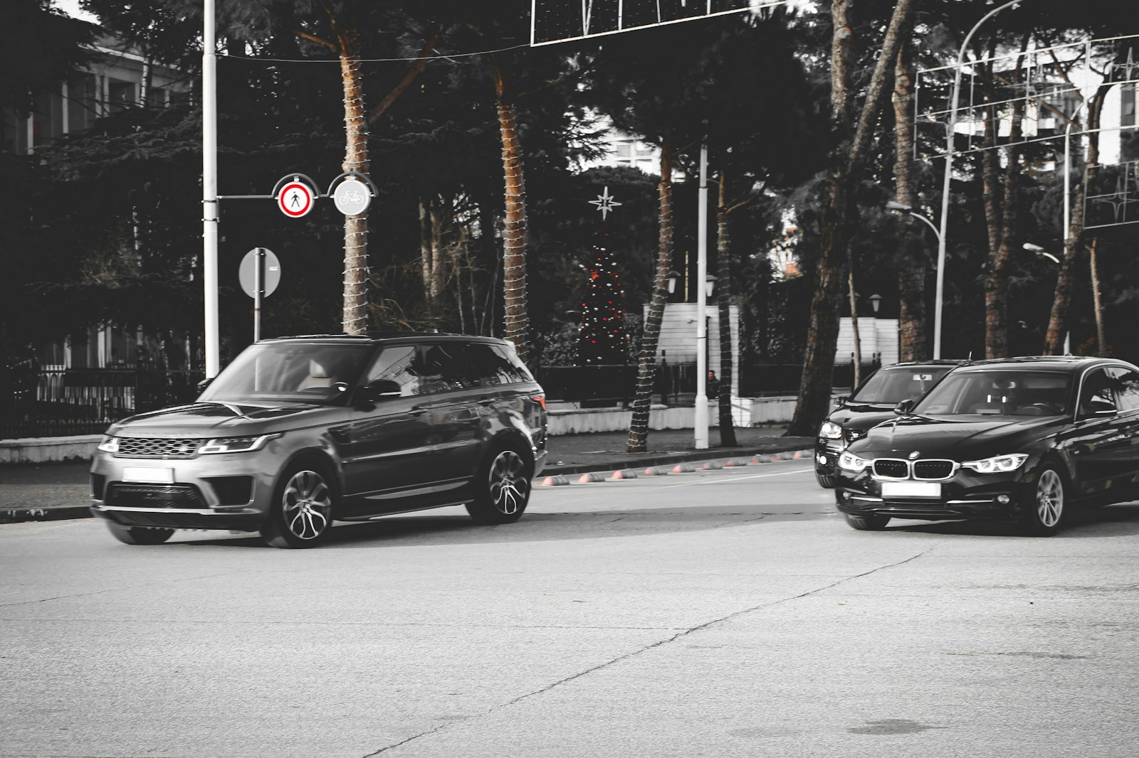 Executive cars on a city road for a corporate roadshow
